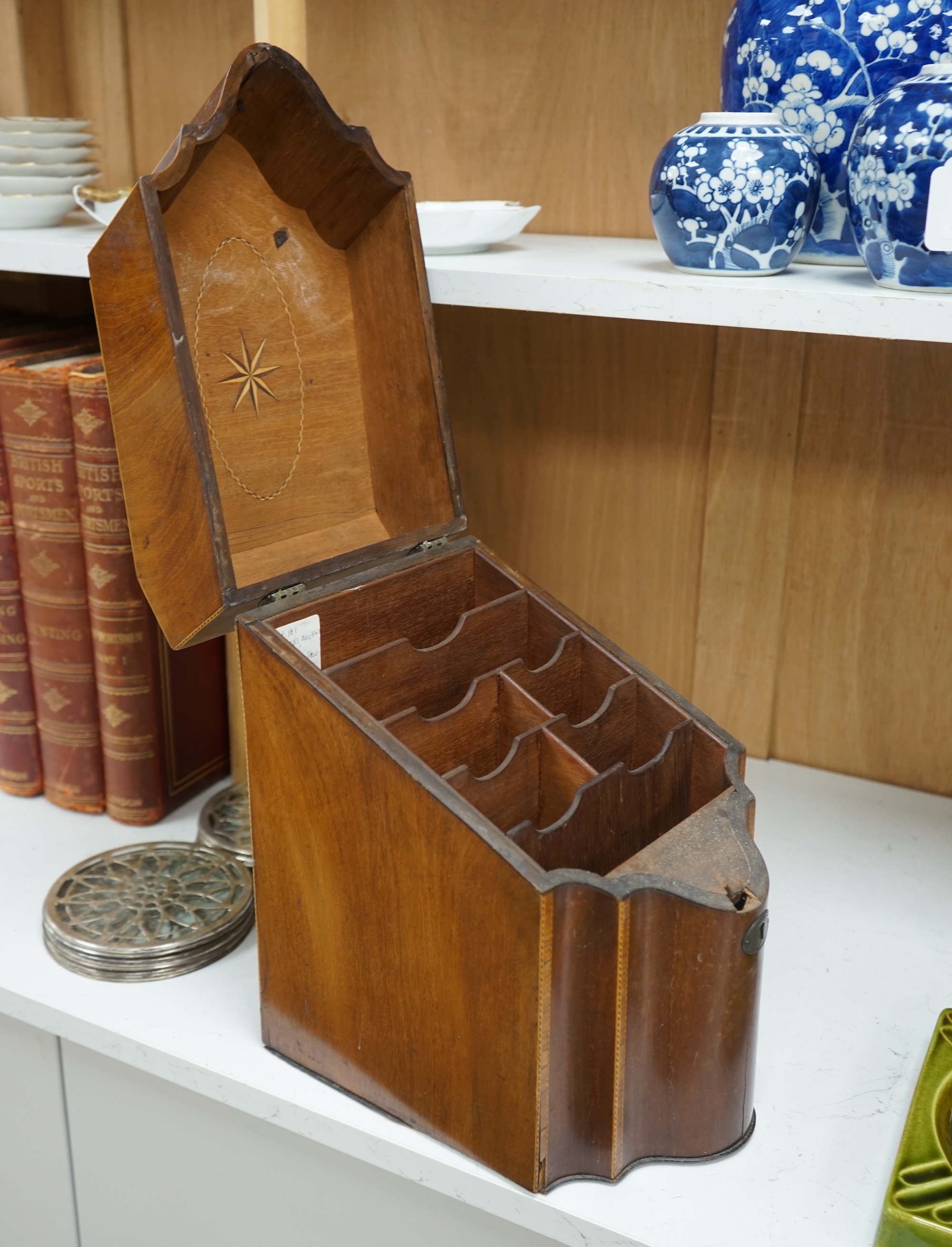 A George III mahogany shell inlaid knife box, converted to a stationery box, 36.5cm high at the back. Condition - needs cleaning and possibly repolishing